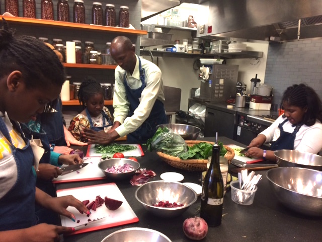 Kabui cooking with students