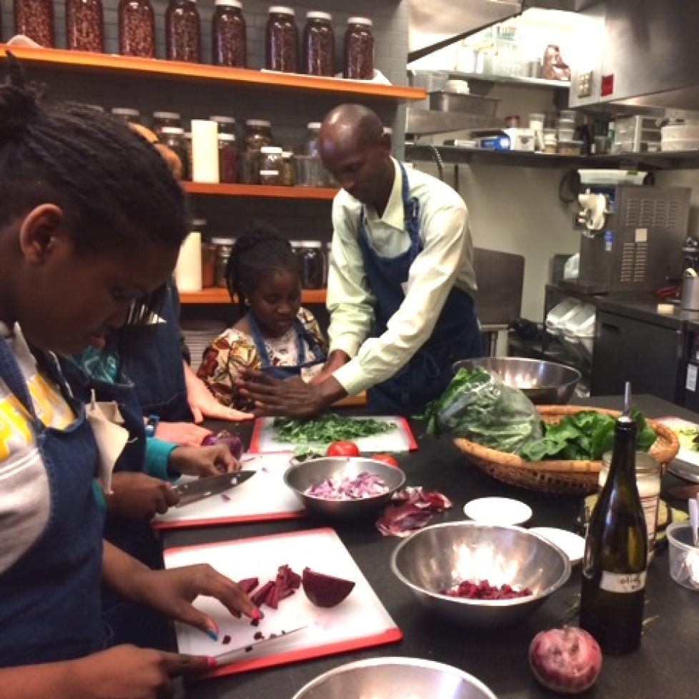 Kabui cooking with students